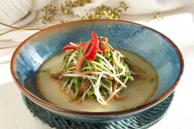 Pea Sprouts with Tea Tree Mushrooms in Broth